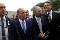 Brazil's President Jair Bolsonaro and Brazil's Economy Minister Paulo Guedes leave the Planalto Palace to deliver the economic reform package to National Congress, in Brasilia