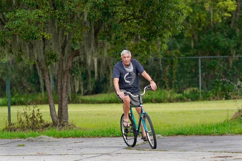 James Farr rides his bike outside the Good Samaritan Society's Kissimmee Village in 2020.