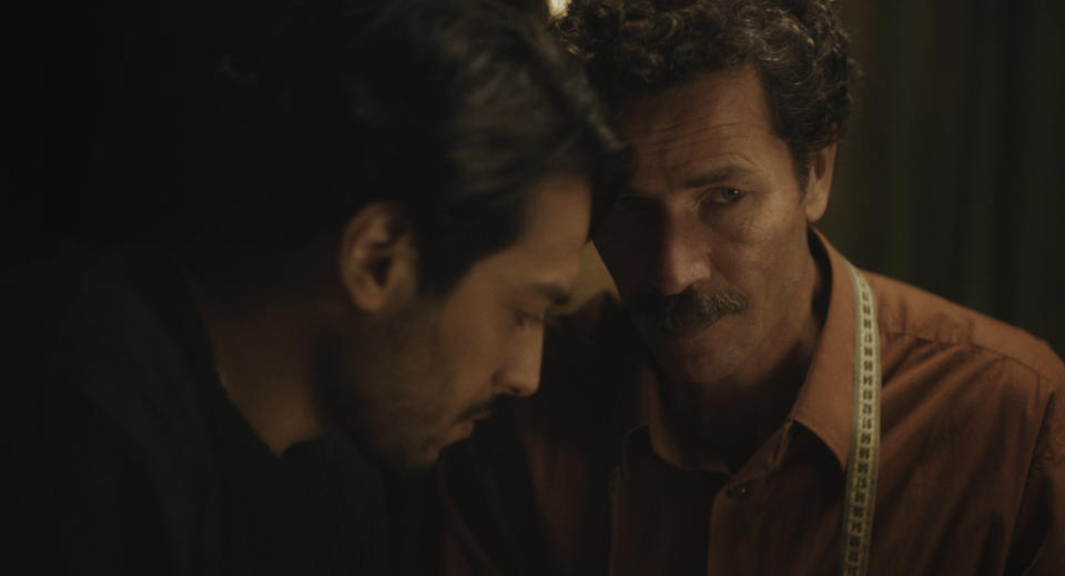 This photo provided by Ali n' Productions shows Ayoub Missioui as Youssef and Saleh Bakri as Halim in a scene from the movie "The Blue Caftan" directed by Maryam Touzani. “I’m really hoping that it would be able to trigger a debate about the LGBT community and its place …, things that we don’t generally talk about because they are sensitive subjects,” Touzani says. “For a healthy society, it’s important to be able to talk about everything.” (Ali n' Productions via AP)