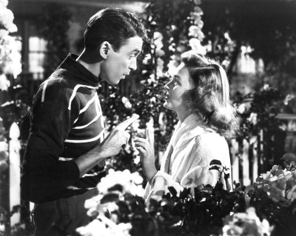 American actors James Stewart (1908 - 1997) as George Bailey, and Donna Reed (1921 - 1986) as Mary Hatch Bailey in a promotional still from 'It's A Wonderful Life', directed by Frank Capra, 1946. (Photo by Silver Screen Collection/Getty Images)