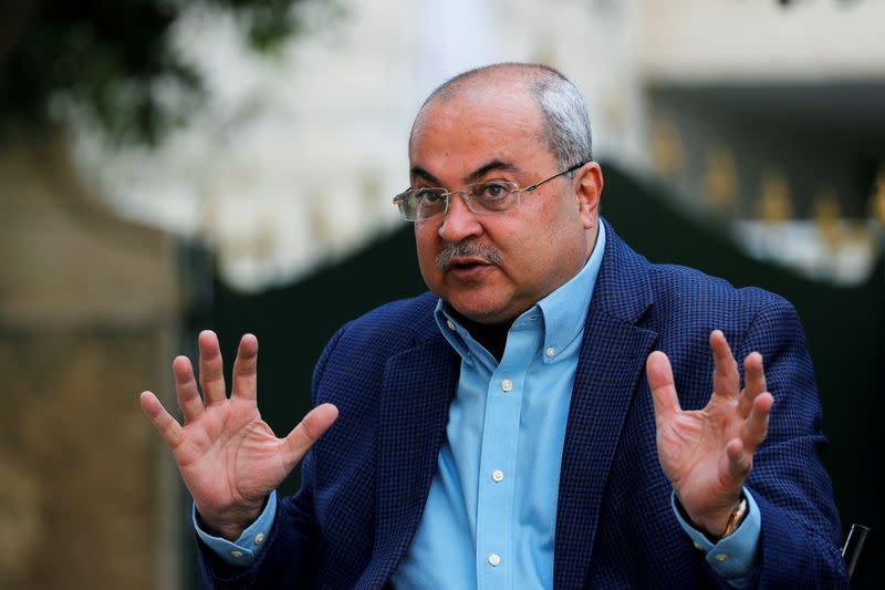 Arab politician Ahmad Tibi, of the Joint List party, gestures during his interview with Reuters at his house in East Jerusalem