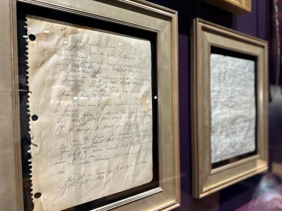 Handwritten nine to five lyrics in frames at Dolly Parton Heartsong resort