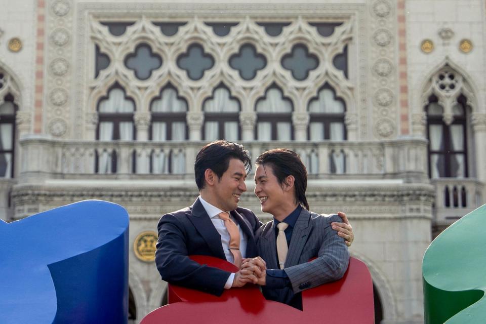 Members of the LGBTQ community celebrate after the Thai parliament passed the final senatorial vote on the same-sex marriage bill at Government House in Bangkok (AFP via Getty)