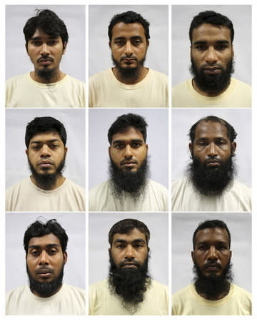 A combination of undated Ministry of Home Affairs handout mugshots, distributed on January 20, 2016, of Bangladeshi construction workers who had been arrested between November 16 and December 1, 2015 under the Internal Security Act in Singapore for supporting Islamist groups including al Qaeda and Islamic State. (Top row L-R), Hossain Mohammad Faruk, Hossain Mohammad Sajib, Hossen Md Akram, (middle row L-R) Islam Saiful, Jasim Md, Jewel Shaikh Khorshad Ali, (bottom row L-R) Mamun Al, Md Rowshan Alam Md Rezaul Karim and Md Sanuar Hossain Md Amjad Hossain. REUTERS/Ministry of Home Affairs/Handout