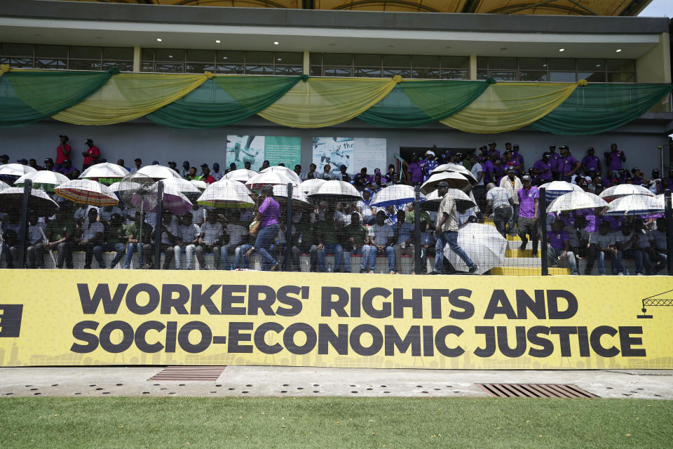 Nigeria workers attends the Labour Day Celebration at the Mobolaji Johnson Arena in Lagos, Nigeria, Monday, May 1, 2023. Large crowds gathered at the Mobolaji Johnson Arena Monday to mark the International Labour Day dedicated to workers' rights and socio-economic justice. (AP Photo/Sunday Alamba)