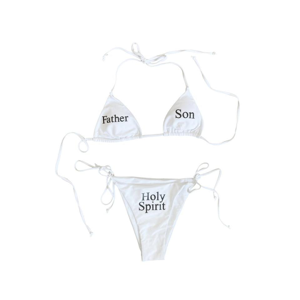 White bikini with 'Father' written on the left side, 'Son' written on the right side, and 'Holy Spirit' on the bottoms