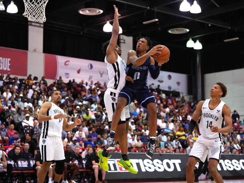 Jul 12, 2022; Las Vegas, NV, USA; Memphis Grizzlies guard Kennedy Chandler (0) shoots the ball against Brooklyn Nets guard Cam Thomas (24) during an NBA Summer League game at Cox Pavilion. Mandatory Credit: Stephen R. Sylvanie-USA TODAY Sports