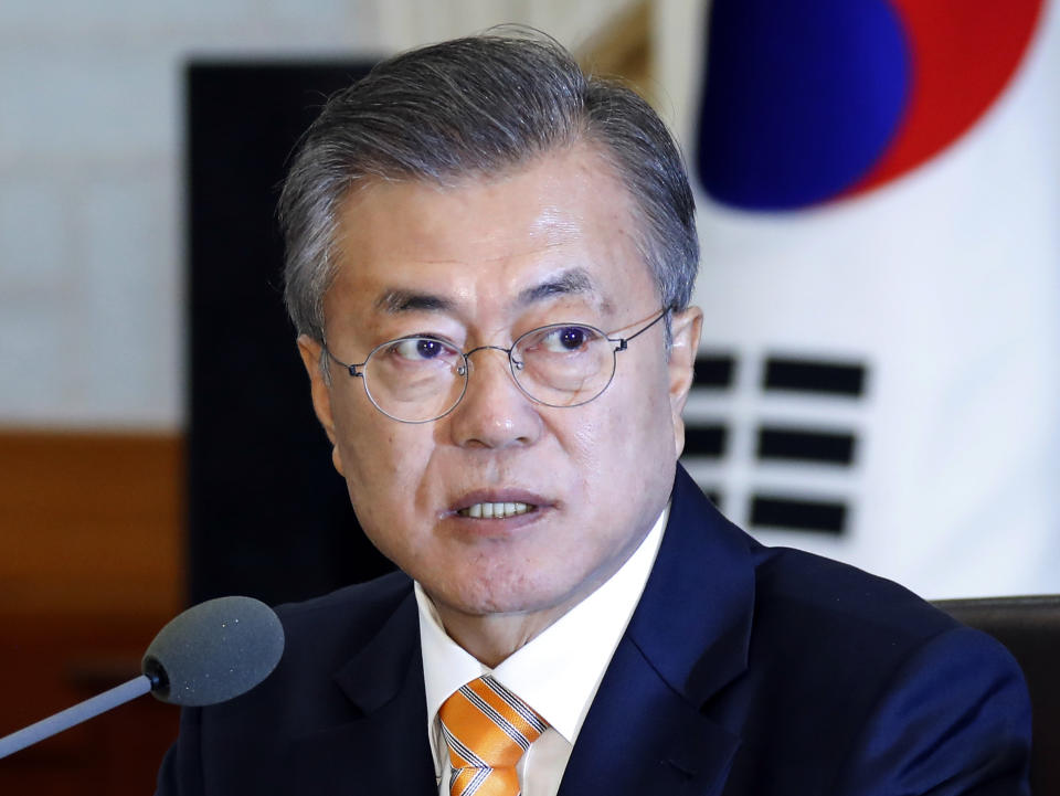 South Korean President Moon Jae-in speaks during a cabinet meeting at the presidential Blue House in Seoul, South Korea, Tuesday, Oct. 23, 2018. The government of Moon formally approved the rapprochement deals he made with North Korean leader Kim Jong Un last month. (Bee Jae-man/Yonhap via AP)