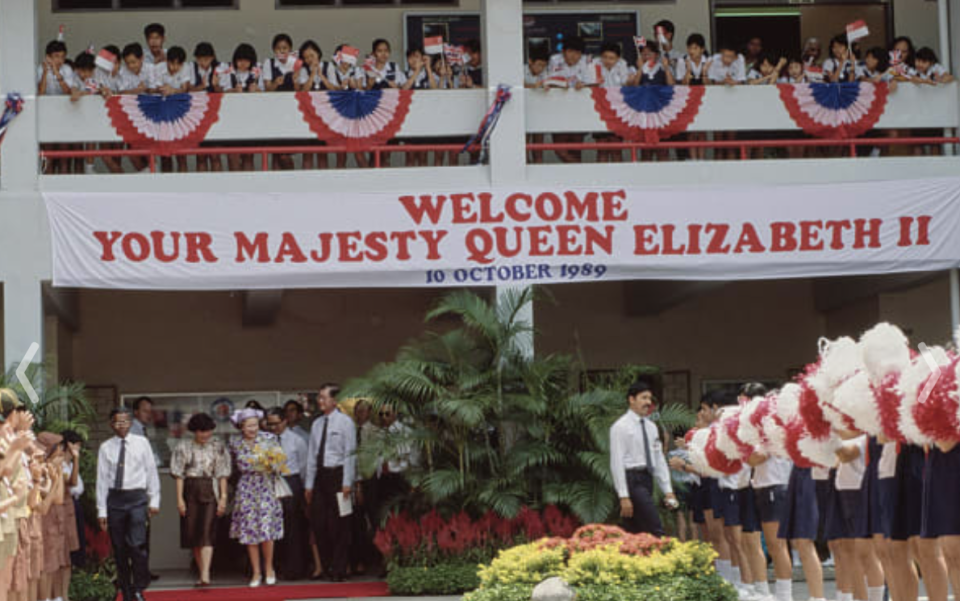 A banner welcomes Queen Elizabeth ll during a visit to Townsville Primary School on 10 October 1989 as part of the royal couple's three-day official visit to Singapore. 