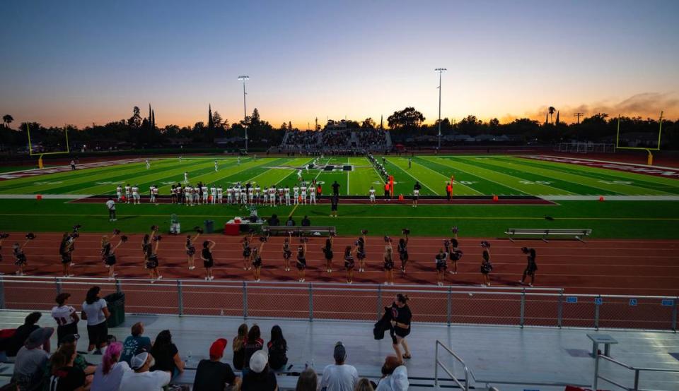 The Hiram Johnson Warriors prepare to kick off against the Bella Vista Broncos in their season opener on Friday. It was the Warriors’ first game in the Sacramento high school’s newly renovated football stadium, where games can now be played under lights at night. Home and away bleachers with almost 1,700 seats, an overhead entrance sign and home and visitor concession and restroom buildings have also been added.