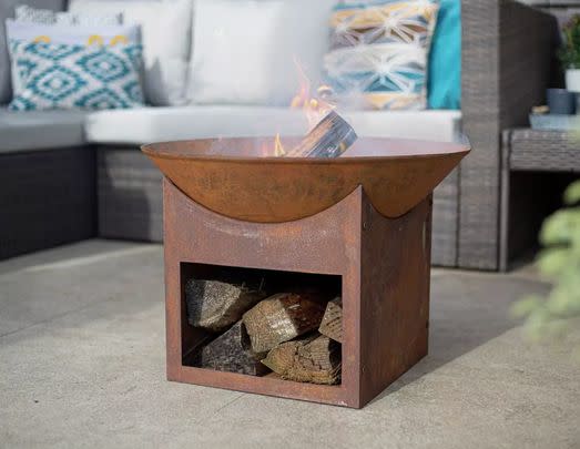 Gather around this gorgeous and rustic firepit