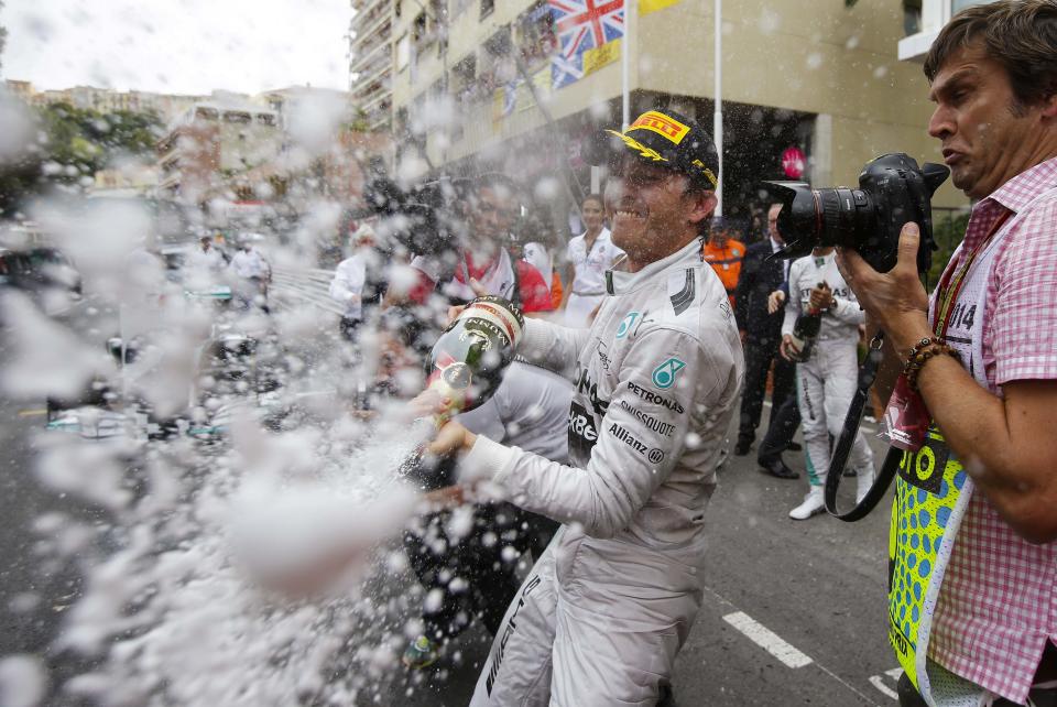 Mercedes Formula One driver Nico Rosberg of Germany sprays champagne after winning the Monaco Grand Prix in Monaco May 25, 2014. REUTERS/Max Rossi (MONACO - Tags: SPORT MOTORSPORT F1)