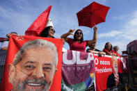 FILE - Supporters of Brazil's President Luiz Inacio Lula da Silva celebrate his 78th birthday outside the official presidential residence, Alvorada Palace, in Brasilia, Brazil, Oct. 27, 2023. Lula likes to boast he had a good first year returning to the job. Still, Lula has struggled to boost his support on Main Street and among lawmakers. (AP Photo/Eraldo Peres, File)