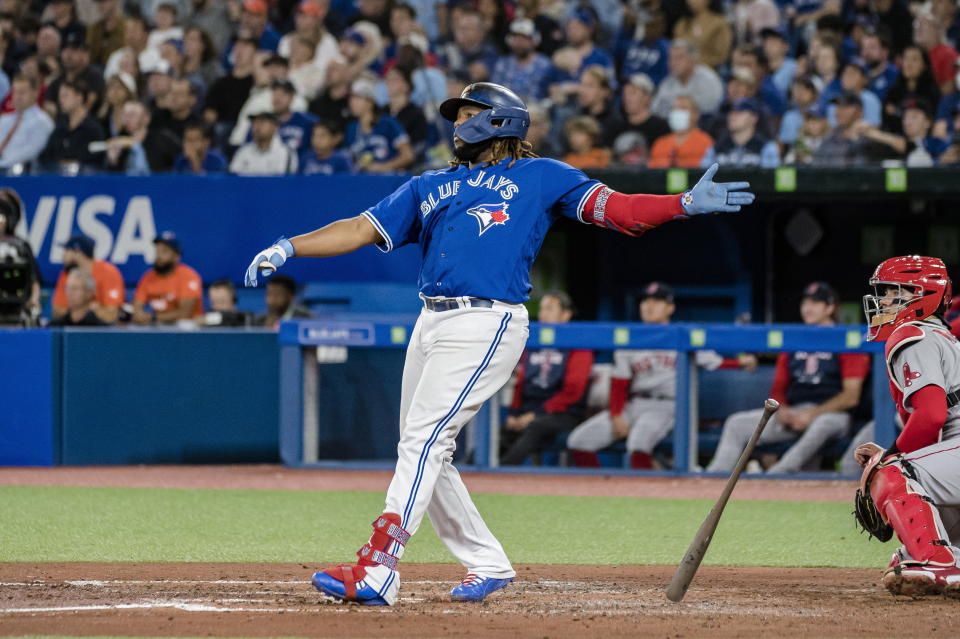 Toronto Blue Jays' Vladimir Guerrero Jr. watches his two-run home run against the Boston Red Sox during the third inning of a baseball game Friday, Sept. 30, 2022, in Toronto. (Christopher Katsarov/The Canadian Press via AP)