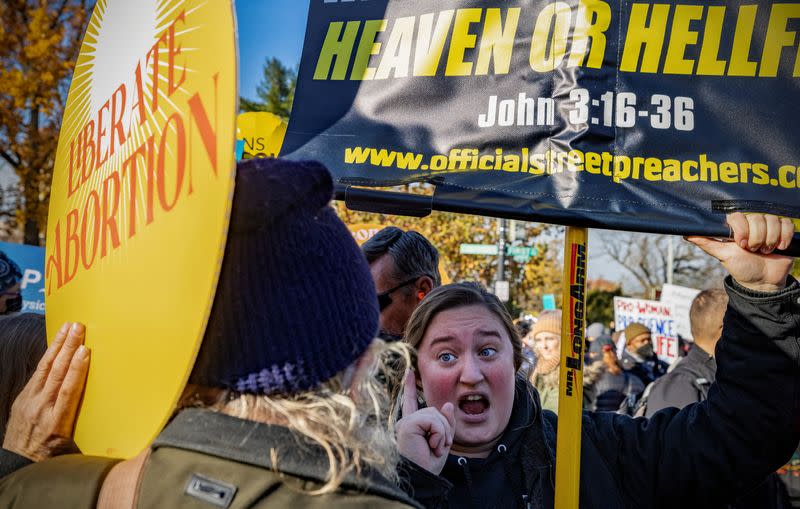 FILE PHOTO: Anti-abortion and pro-abortion rights protesters gather outside Supreme Court in Washington