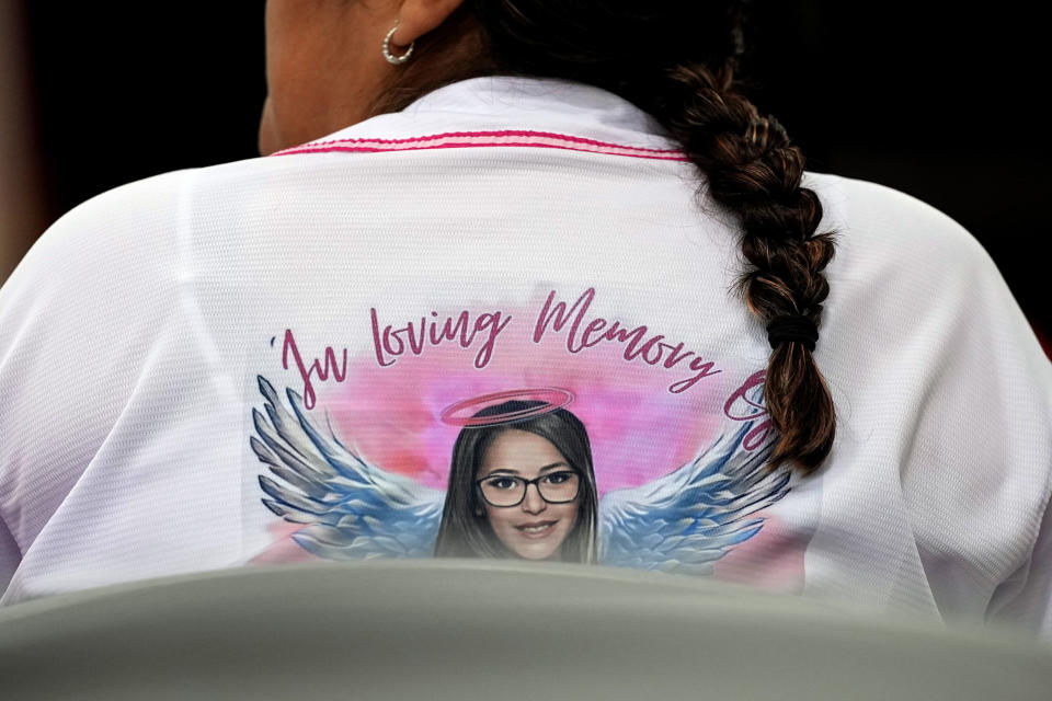 A family member attends a special city council meeting in Uvalde, Texas, Thursday, March 7, 2024. Almost two years after the deadly school shooting in Uvalde that left 19 children and two teachers dead, the city council met to discuss the results of an independent investigation it requested into the response by local police officers. (AP Photo/Eric Gay)