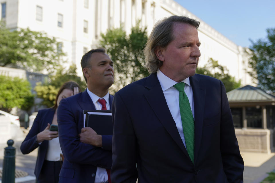 Former White House counsel Don McGahn departs after appearing for questioning behind closed doors by the House Judiciary Committee on Capitol Hill in Washington, Friday, June 4, 2021. (AP Photo/Patrick Semansky)