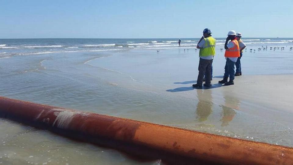 Beach renourishment workers on Hilton Head Island on Sept. 5, 2016, plan the week ahead as the project restarts following a shutdown during Tropical Storm Hermine.