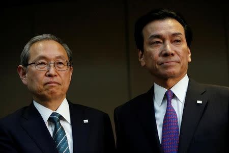 Toshiba Corp incoming President and chief executive Satoshi Tsunakawa (L) and incoming chairman Shigenori Shiga pose for a photograph at a news conference at the company headquarters in Tokyo, Japan May 6, 2016. REUTERS/Issei Kato