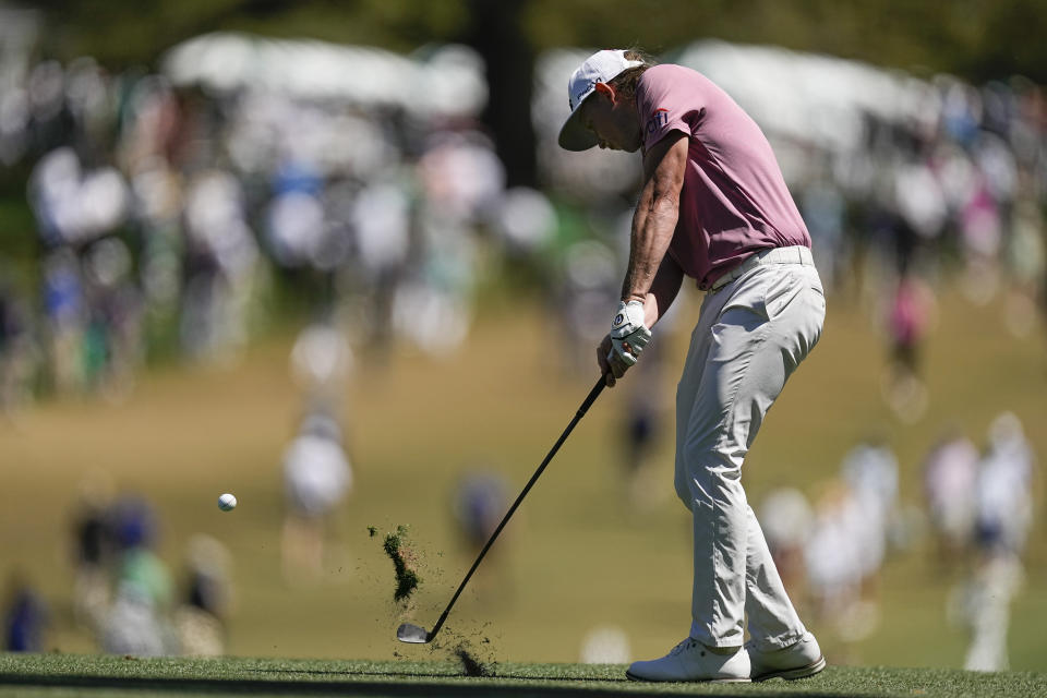Cameron Smith, of Australia, hits on the first fairway during the final round at the Masters golf tournament on Sunday, April 10, 2022, in Augusta, Ga. (AP Photo/Robert F. Bukaty)