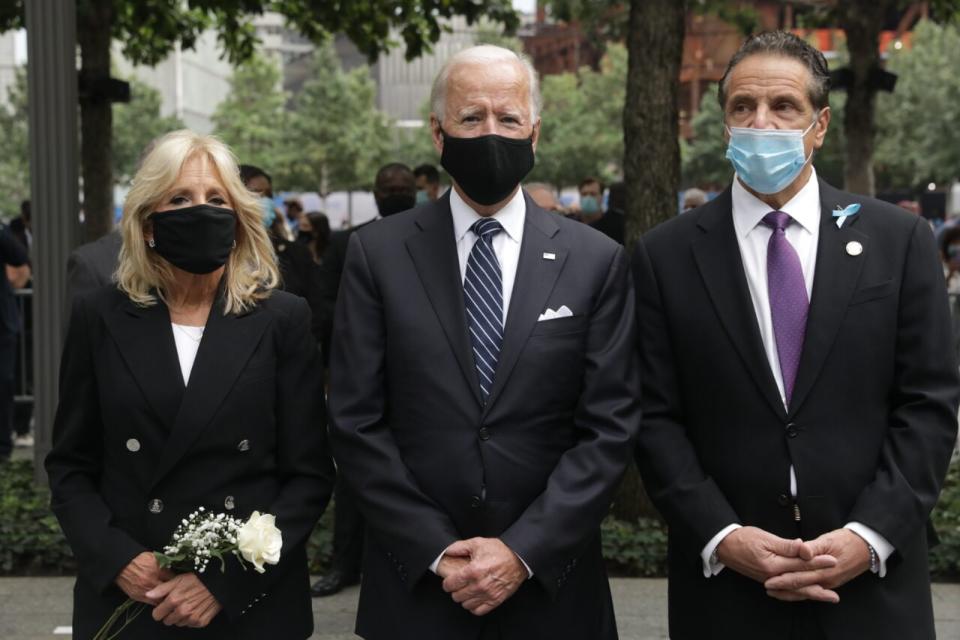 Democratic presidential nominee Joe Biden (center), Dr. <span class="caas-xray-inline-tooltip"><span class="caas-xray-inline caas-xray-entity caas-xray-pill rapid-nonanchor-lt" data-entity-id="Jill_Biden" data-ylk="cid:Jill_Biden;pos:3;elmt:wiki;sec:pill-inline-entity;elm:pill-inline-text;itc:1;cat:OfficeHolder;" tabindex="0" aria-haspopup="dialog"><a href="https://search.yahoo.com/search?p=Jill%20Biden" data-i13n="cid:Jill_Biden;pos:3;elmt:wiki;sec:pill-inline-entity;elm:pill-inline-text;itc:1;cat:OfficeHolder;" tabindex="-1" data-ylk="slk:Jill Biden;cid:Jill_Biden;pos:3;elmt:wiki;sec:pill-inline-entity;elm:pill-inline-text;itc:1;cat:OfficeHolder;" class="link ">Jill Biden</a></span></span> (left) and New York Gov. Andrew Cuomo (right) attend a 9/11 memorial service at the National September 11 Memorial and Museum on September 11, 2020 in New York City. (Photo by Amr Alfiky – Pool/Getty Images)