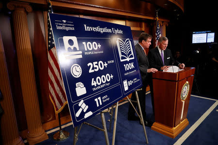 Sen. Richard Burr (R-NC), accompanied by Sen. Mark Warner (D-VA), gives an update on the ongoing investigation into Russian involvement in the 2016 election at the Capitol Building in Washington, U.S., October 4, 2017. REUTERS/Aaron P. Bernstein