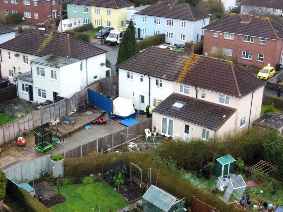 A police forensics tent at the house (PA)