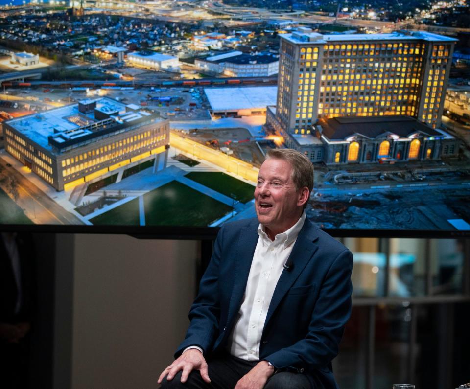 Bill Ford, Executive Chair, Ford Motor Co., sits on stage with an image of the Michigan Central and the reimagined Book Depository in the background as they launch NewlabÕs opening in Detroit on Tuesday, April 24, 2023.