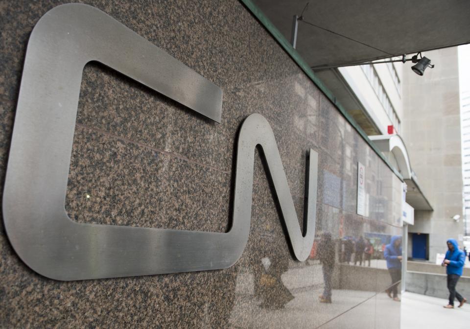 A man walks into Central Station next to Canadian National headquarters in Montreal, Tuesday, Nov. 26, 2019. Canadian National sweetened its offer to buy Kansas City Southern railroad Thursday, May 13, 2021, and derailed rival Canadian Pacific’s bid for the railroad that handles traffic in the United States and Mexico. (Graham Hughes/The Canadian Press via AP)