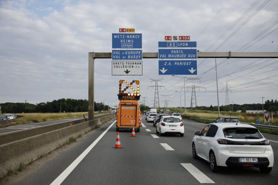 A security and response vehicle closes one of the entrances to the A4 motorway after a tourist plane crashed nearby (AFP via Getty Images)