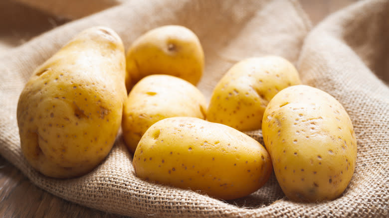 Potatoes lying on a sack