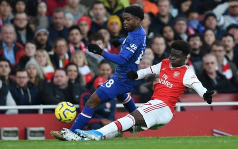 Young winger Bukayo Saka has been pressed into full-back action for Arsenal due to injuries - Credit: GETTY IMAGES