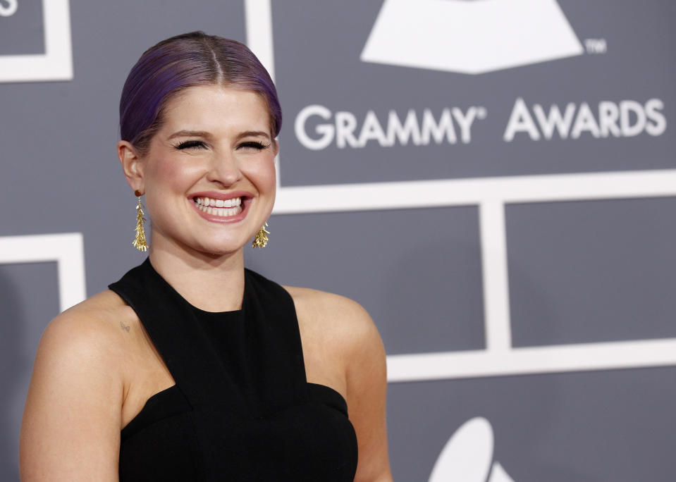 Television personality Kelly Osbourne arrives at the 55th annual Grammy Awards in Los Angeles, California February 10, 2013. REUTERS/Mario Anzuoni (UNITED STATES - Tags: ENTERTAINMENT) (GRAMMYS-ARRIVALS)