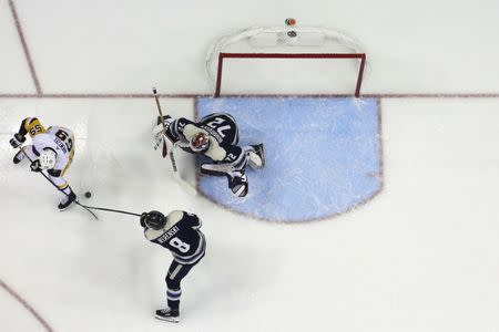 Feb 26, 2019; Columbus, OH, USA; Pittsburgh Penguins center Jake Guentzel (59) shoots against the Columbus Blue Jackets during the first period at Nationwide Arena. Mandatory Credit: Russell LaBounty-USA TODAY Sports