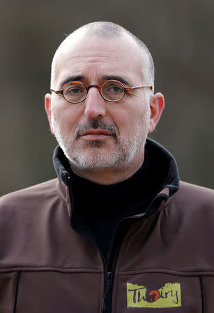 Thoiry zoo and wildlife park director Thierry Duguet poses near rhinoceros enclosure at the zoo, about 50 km (30 miles) west of Paris, France, March 7, 2017. REUTERS/Christian Hartmann