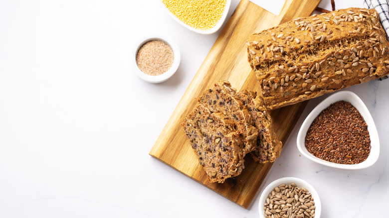 Dense, seeded bread on board