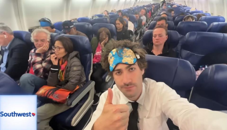 Eric Decker gives a thumbs up from his seat onboard a Southwest Airlines flight. Youtube / Airrack