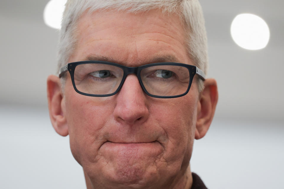 Apple CEO Tim Cook gestures at an Apple event at their headquarters in Cupertino, California, U.S. September 7, 2022. REUTERS/Carlos Barria