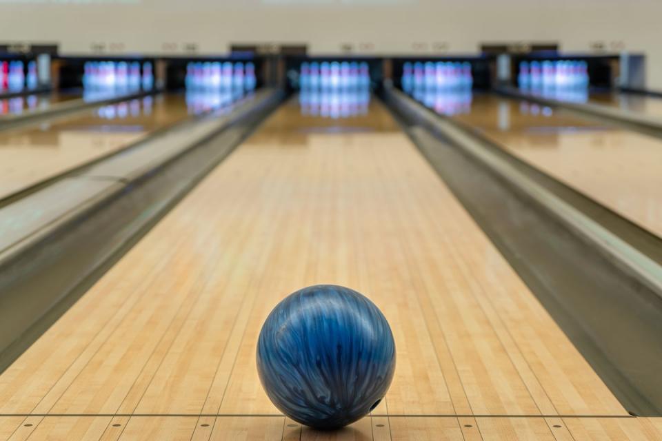 26) Knock some pins down.