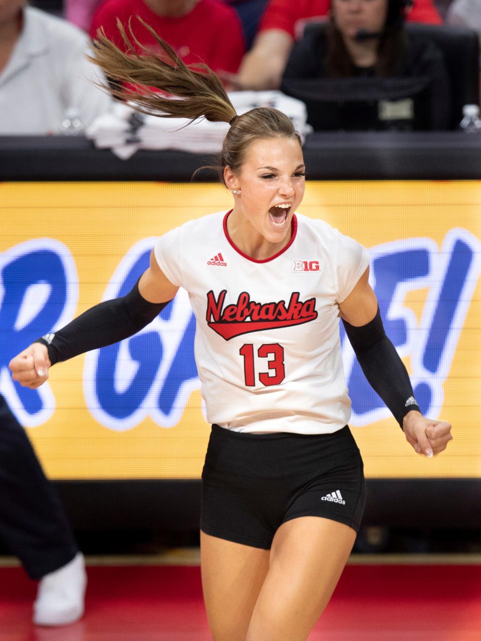 Nebraska's Whitney Lauenstein celebrates after firing a kill in a 2022 match against Ohio State. Lauenstein, who sat out the past season, announced on Tuesday that she will join the Texas volleyball program. Texas beat Nebraska 3-0 in Sunday's Division I title match.