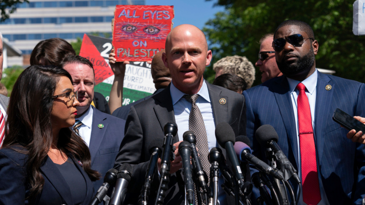 Rep. William Timmons, accompanied by other members of Congress, speaks to the media after touring the George Washington University student encampment.