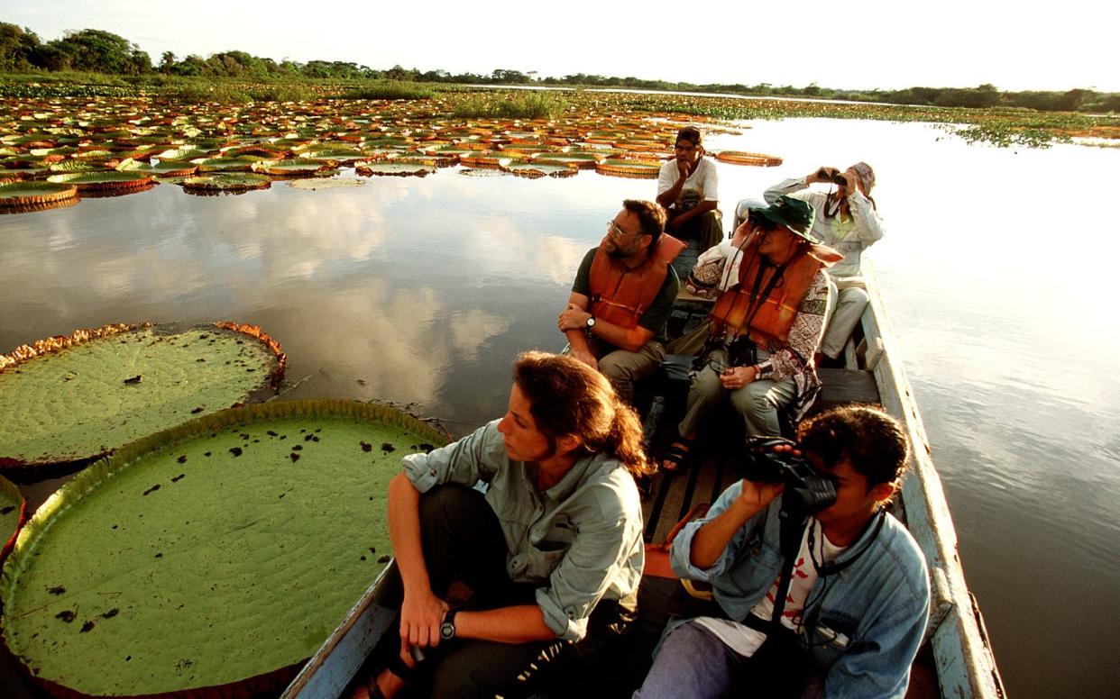 Travellers in a river boat