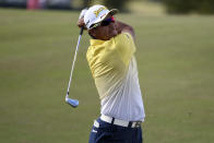 Hideki Matsuyama hits his second shot on the 18th hole during the final round of the Houston Open golf tournament, Sunday, Nov. 8, 2020, in Houston. (AP Photo/Eric Christian Smith)