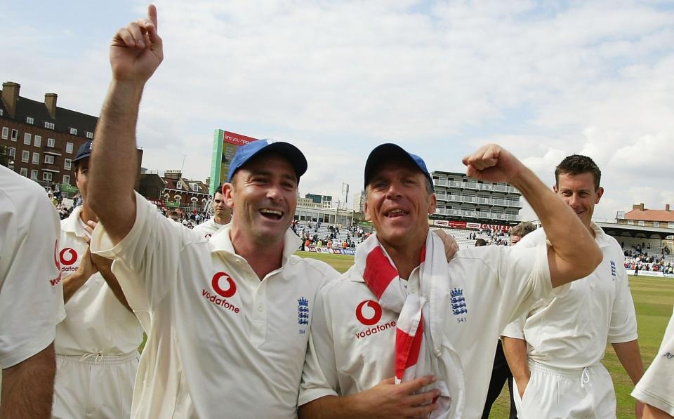 Graham Thorpe (left) and Alec Stewart celebrate England's victory over South Africa in the fifth Test at the Oval on September 8, 2003