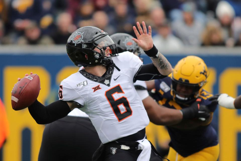 In 2019, OSU's Dru Brown (6) quarterbacked the Cowboys to a 20-13 win at West Virginia when starter Spencer Sanders was injured.