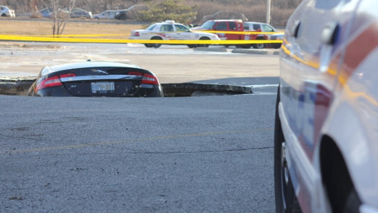 Toronto sinkhole swallows Jaguar