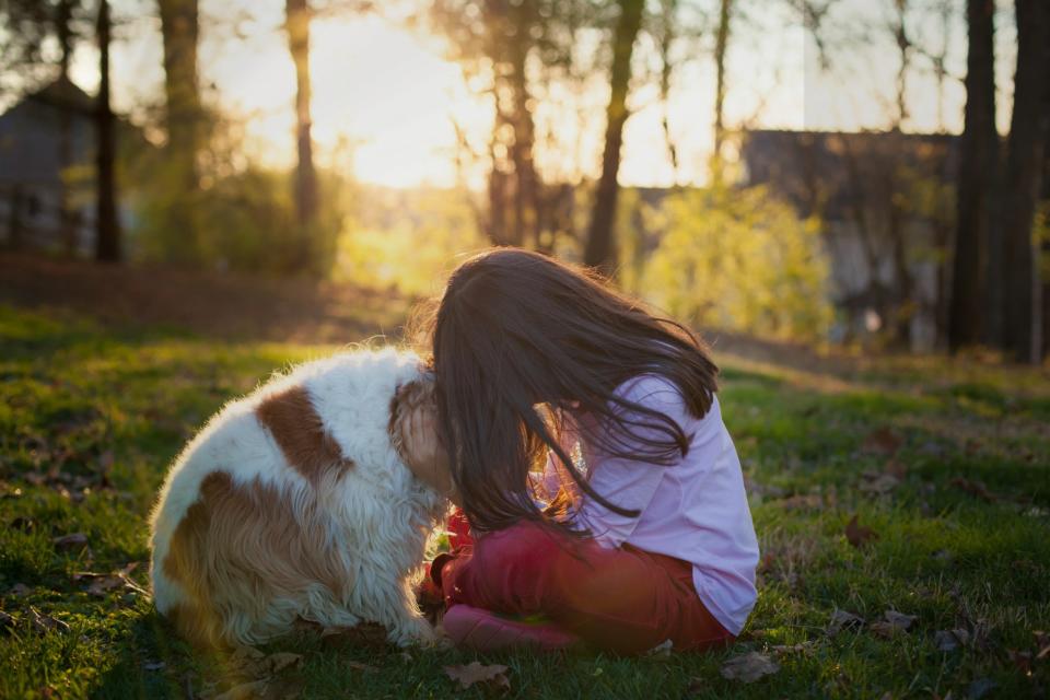 Girl being sad with dog