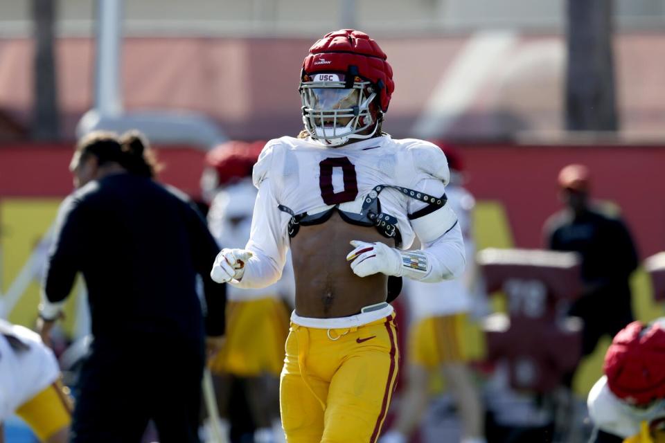 USC defensive lineman Korey Foreman walks on the field during spring football practice.