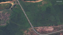 This satellite image provided by Maxar Technologies claims to show vehicles lined up near the town of Sheraro, in the Tigray region of northern Ethiopia Monday, Sept. 26, 2022. New satellite imagery shows military mobilization in Sheraro, which a humanitarian worker this month described to the AP as being targeted by deadly shelling that caused tens of thousands of people to flee. (Maxar Technologies via AP)