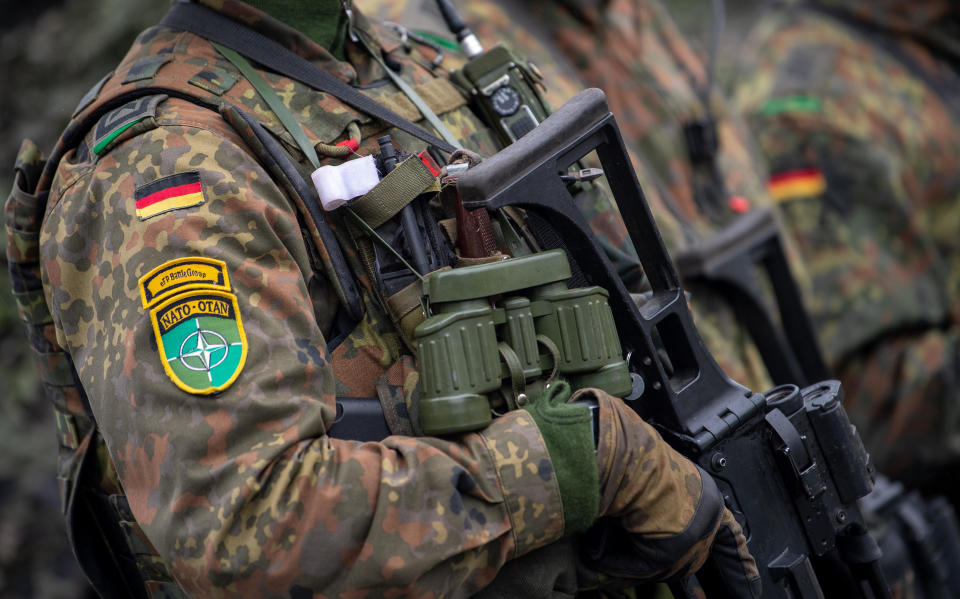 German soldiers of the Enhanced Forward Presence (eFP) Battle Group await a visit by the German Defence Minister in Rukla, Lithuania, October 10, 2019. / Credit: Monika Skolimowska/picture alliance/Getty